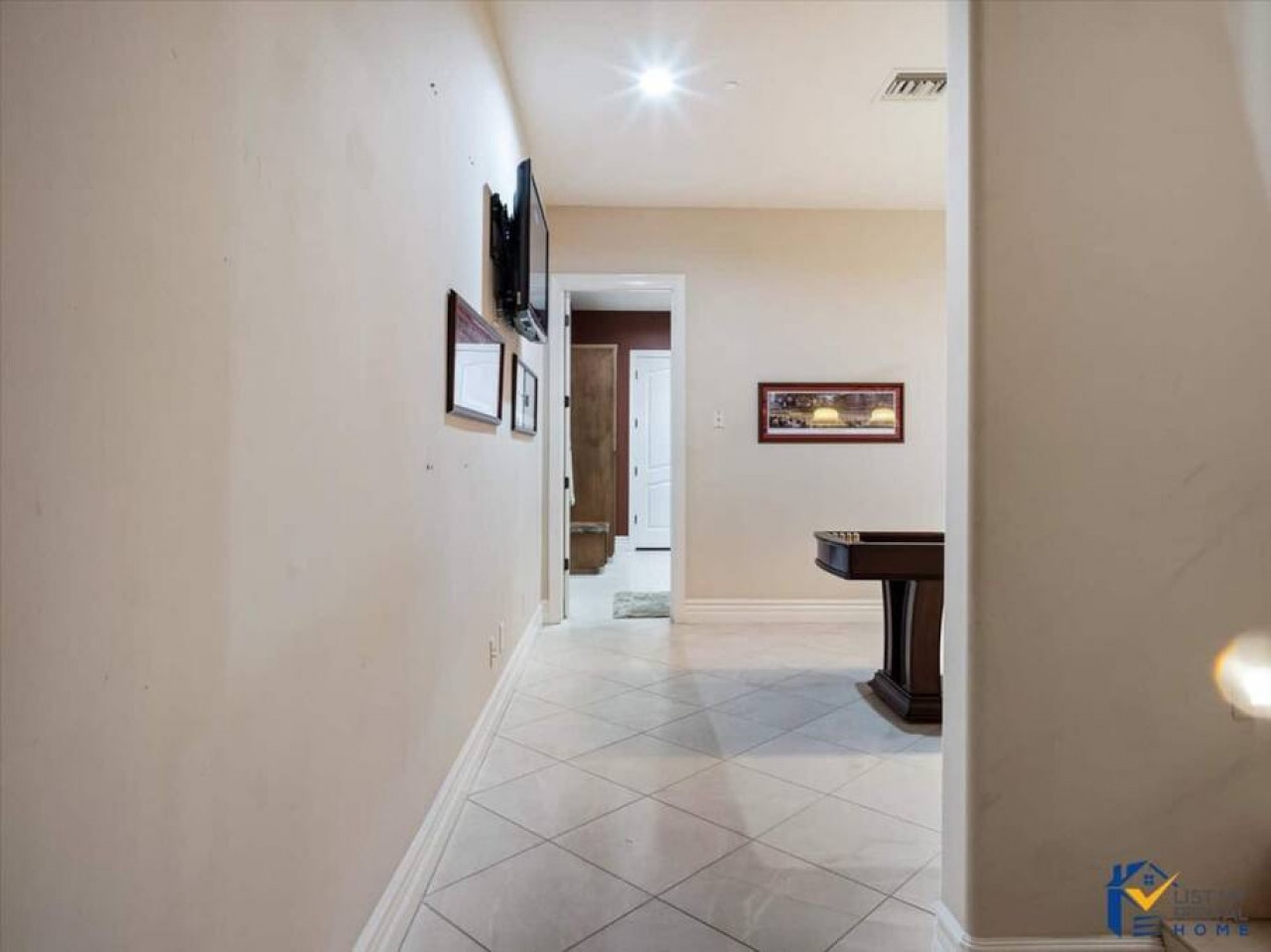 Your elegant entryway welcomes you with gleaming marble floors and thoughtful touches throughout this sophisticated space.
