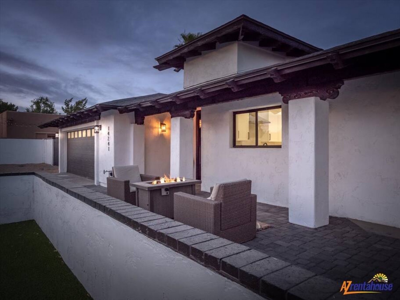 Unwind by your private fire pit on the covered patio, where warm evening conversations flow beneath Spanish-style architecture.