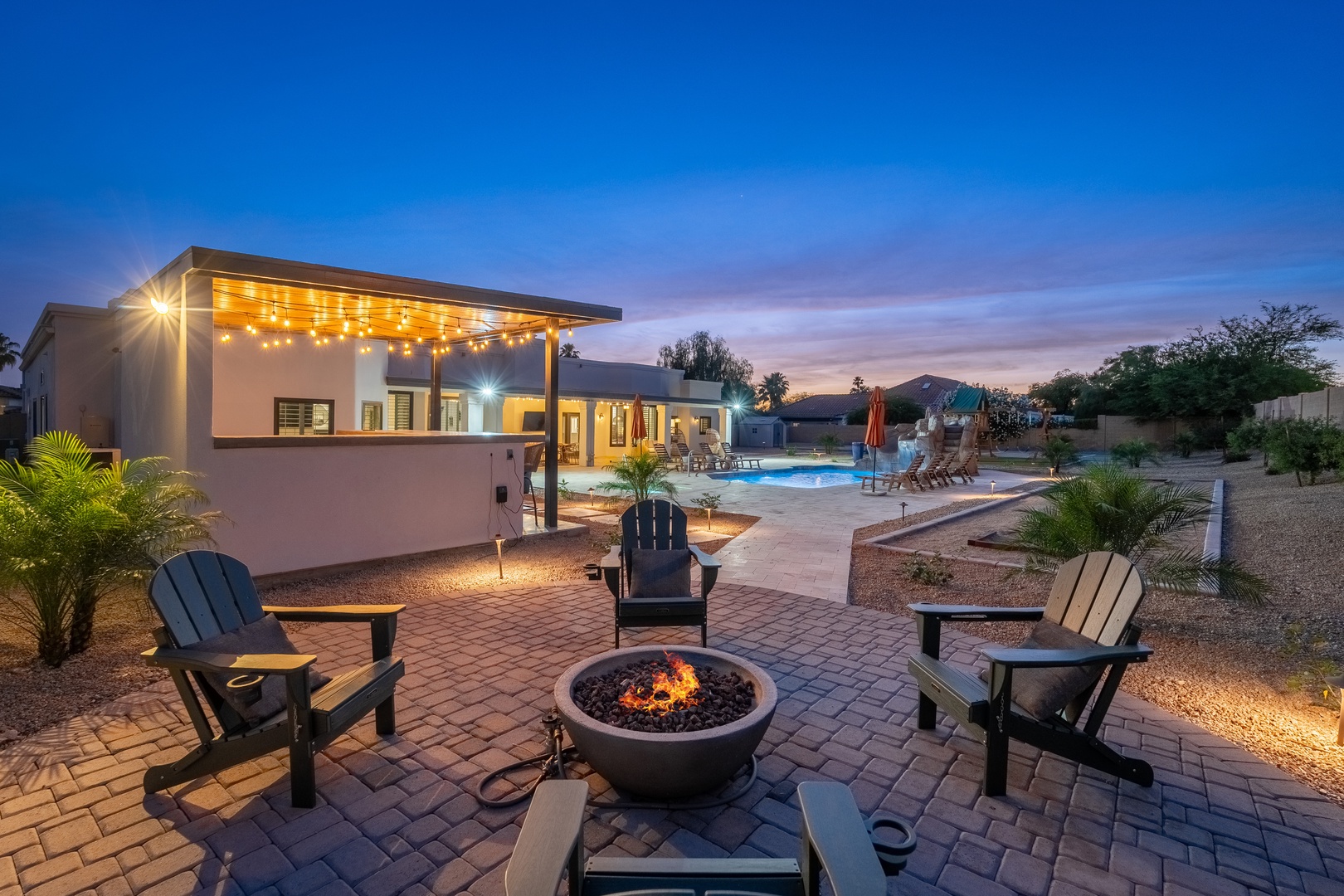 Evenings here are unforgettable: gather around the firepit as the desert sky paints pink and orange, then cool off in the sparkling pool under string lights.