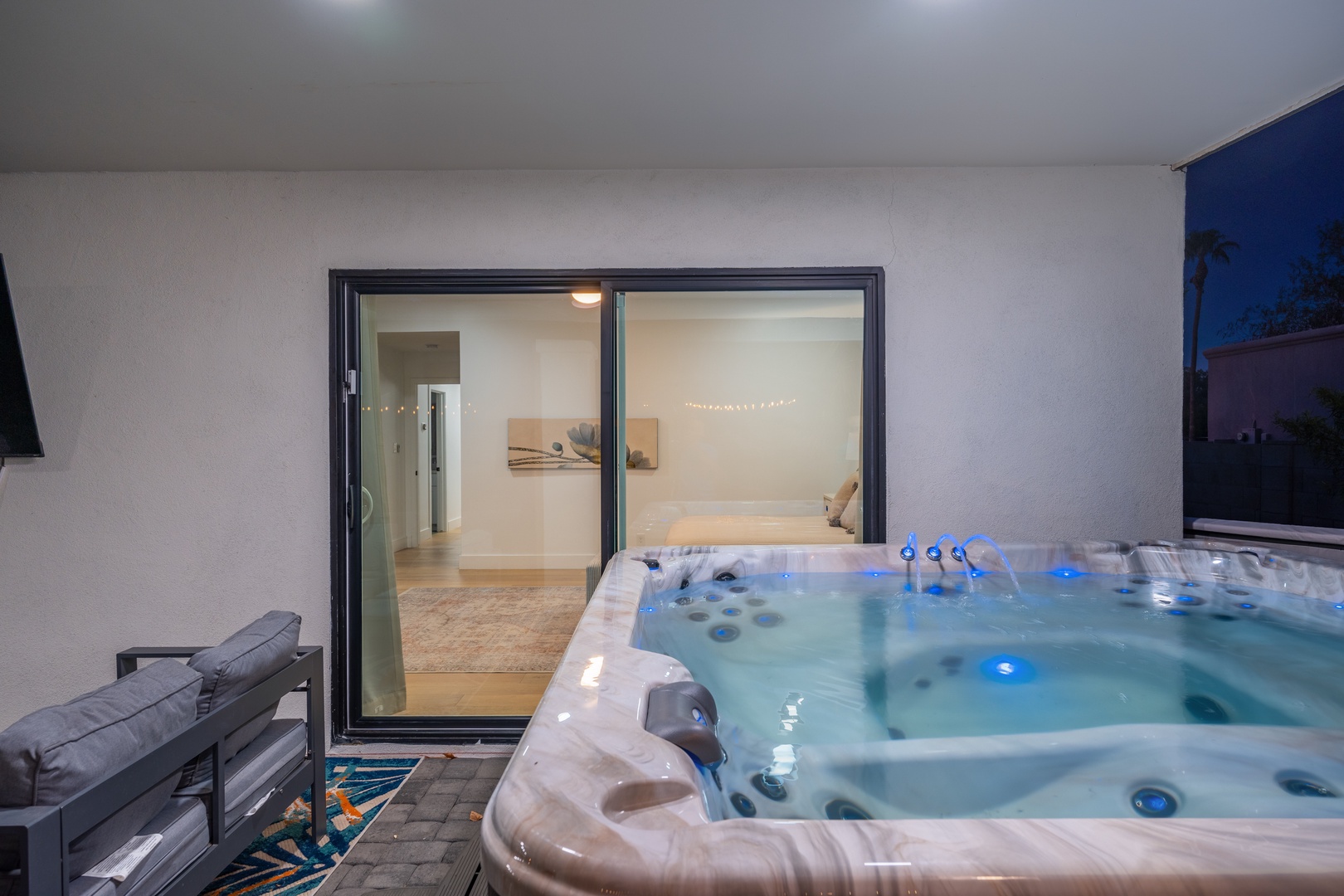 Picture yourself unwinding in your private hot tub, its soothing jets melting away tension as evening settles in around you.