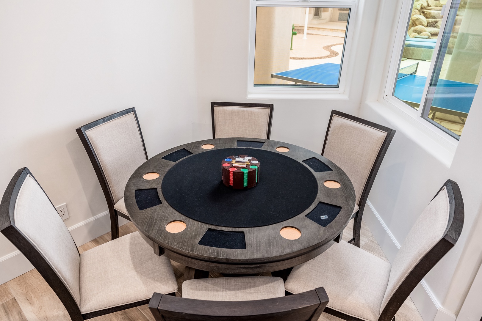 Gather around your private poker table for game nights with friends and family, with pool views from every hand you play.