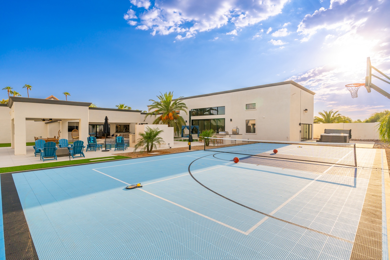 Your private sport court awaits alongside the sparkling pool, perfect for friendly basketball games and creating unforgettable vacation memories under sunny skies.