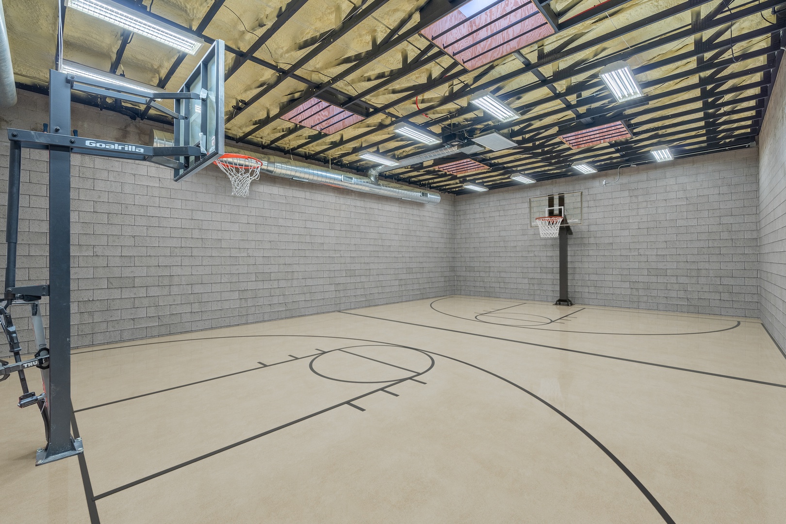 Challenge friends to a private game on your indoor basketball court—a full-size space perfect for staying active rain or shine.