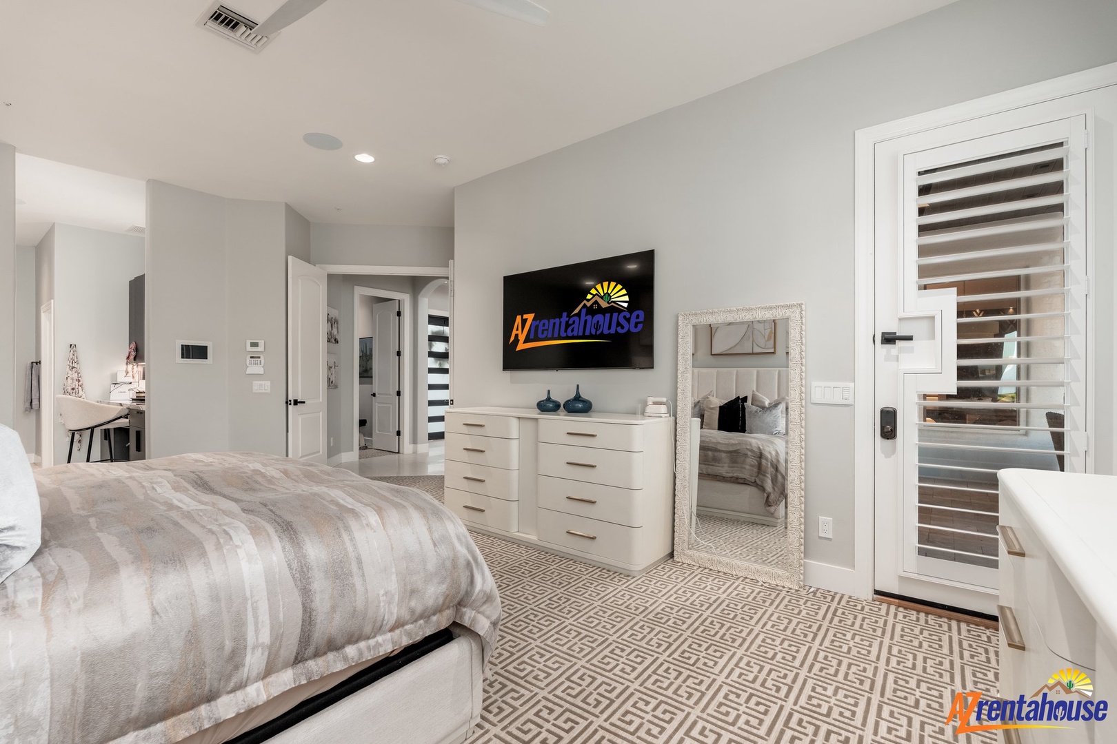 Unwind in your spacious bedroom featuring luxury linens, modern amenities, and thoughtful touches that make you feel instantly at home.