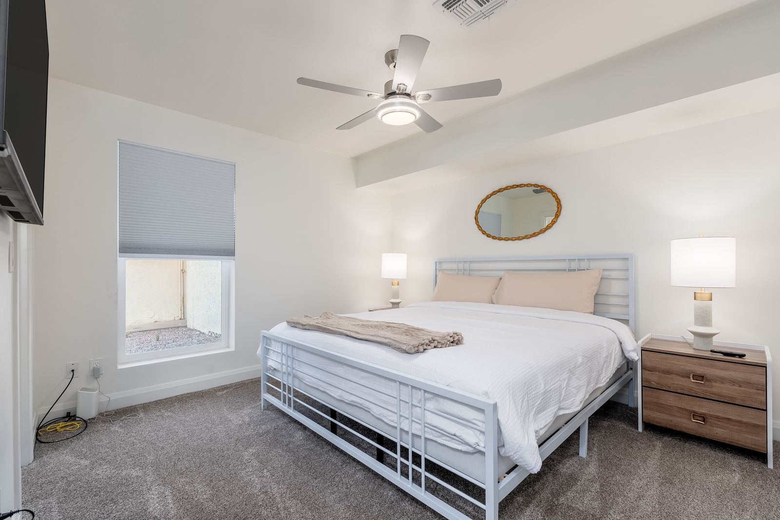 Drift off in your peaceful bedroom with plush bedding, warm lighting, and modern coastal touches that make every night feel like a retreat.