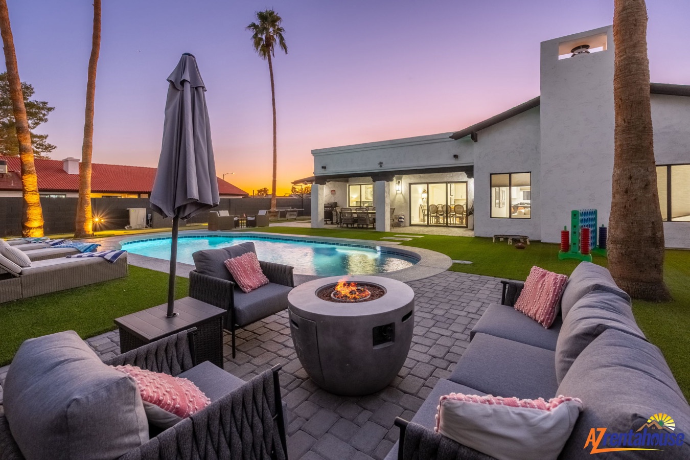 Modern desert retreat with pool, fire pit, and sunset views creates your perfect Arizona getaway.