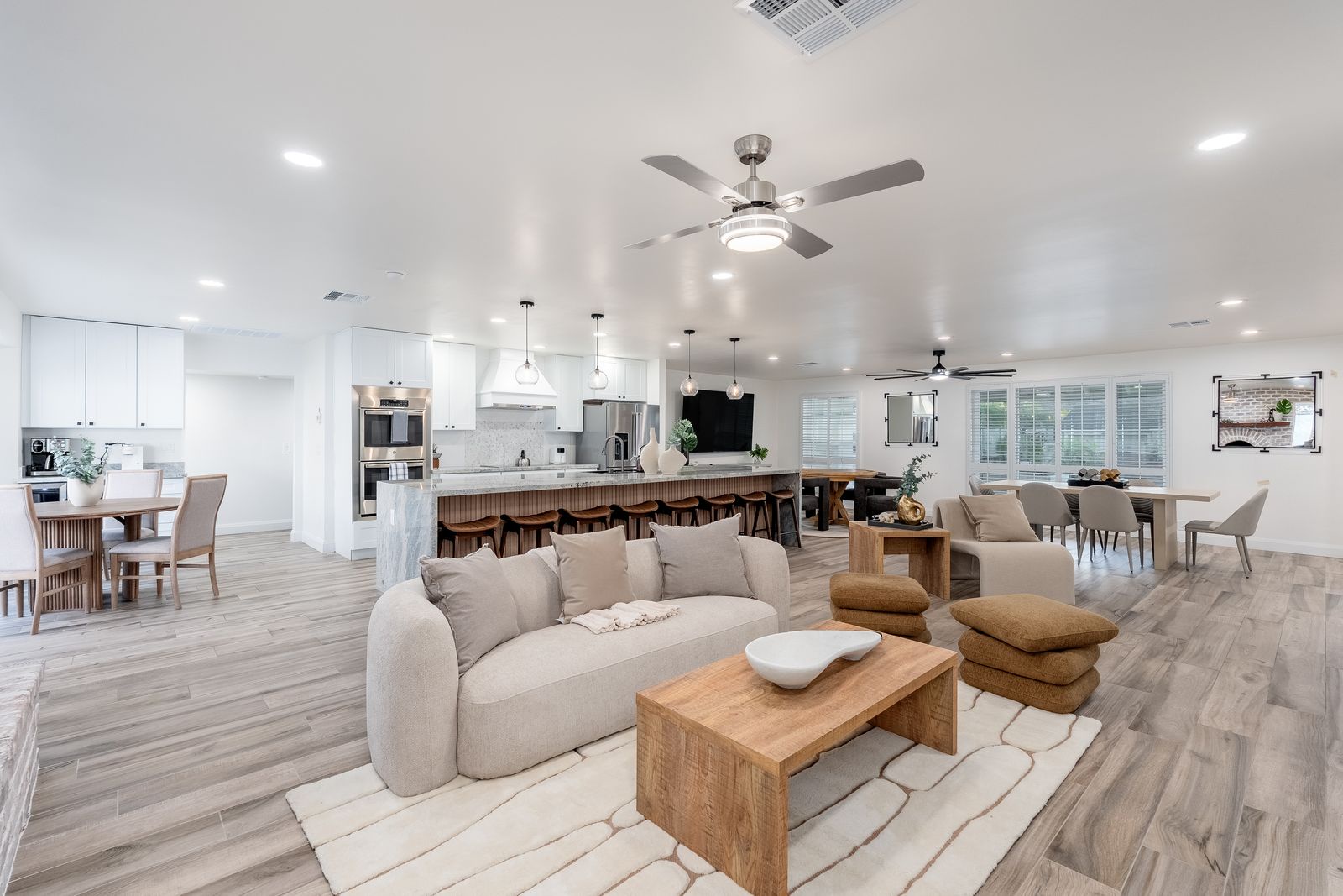 Settle in and feel at home in this bright, open-concept living area designed for gathering and relaxation. Natural light fills the space where you can unwind after a day of exploring.