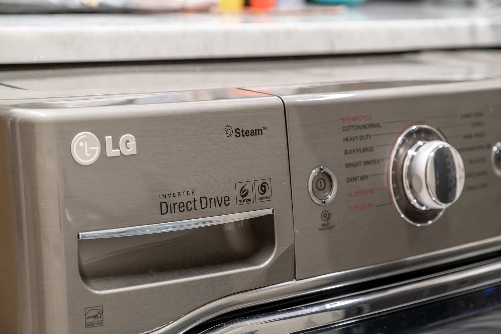 Modern LG Direct Drive washer with steam function for your laundry convenience during your stay.