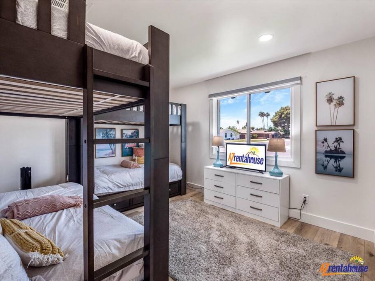 Rest peacefully in your stylish bunk bed retreat with modern furnishings and bright natural light streaming through your window.