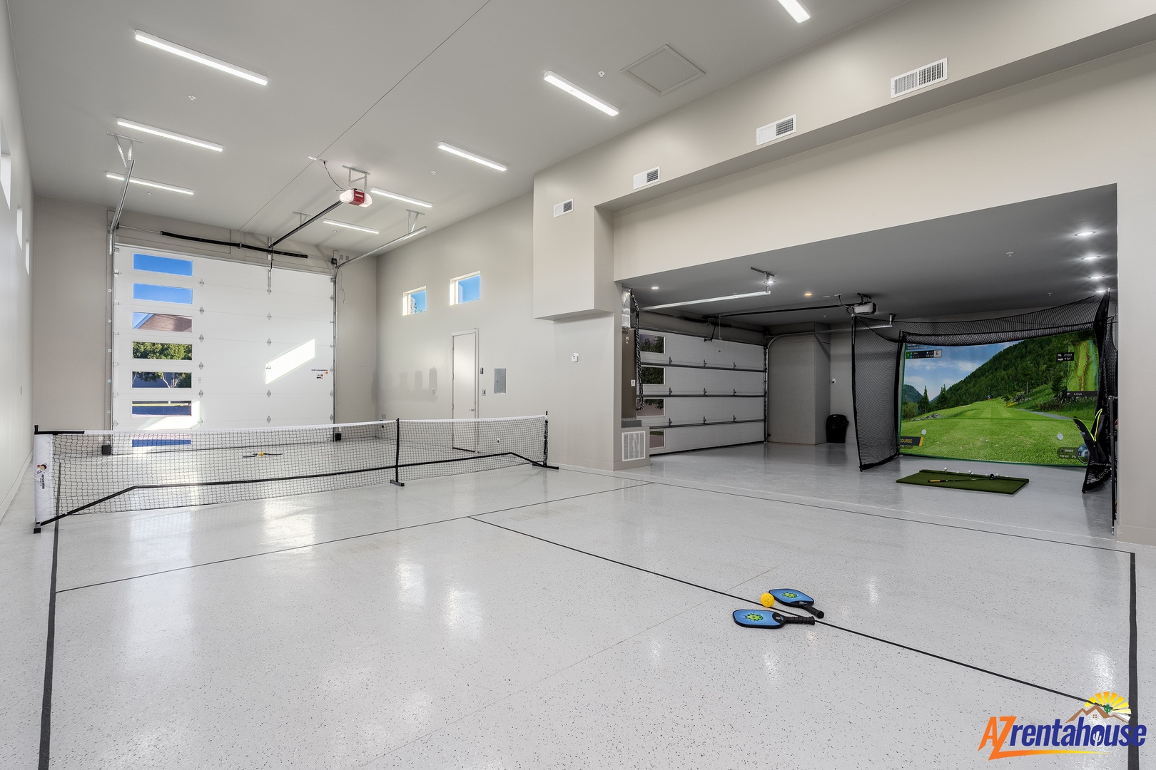 Your private recreational garage features badminton, golf simulator, and versatile space for active entertainment.