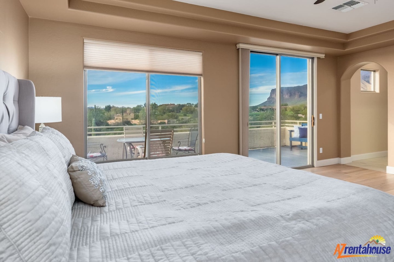Wake up to breathtaking mountain vistas from your private bedroom, where floor-to-ceiling windows frame desert landscapes and your balcony awaits morning coffee moments.