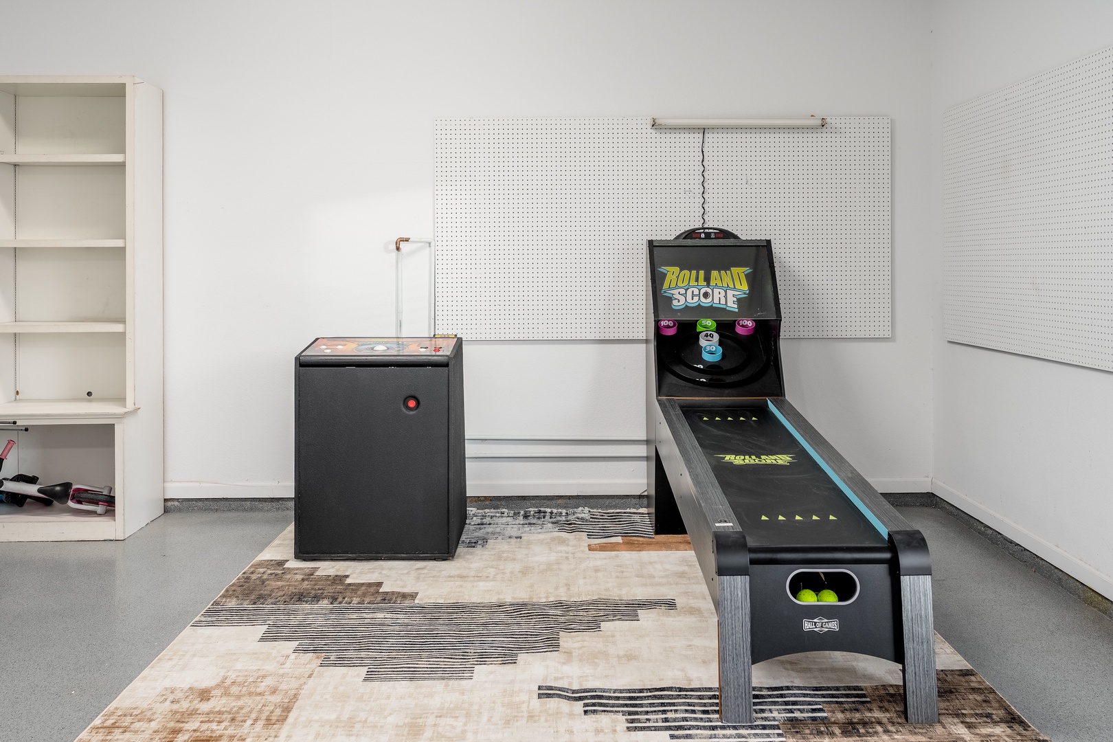Challenge your friends to a classic game of skeeball in your private game room, complete with arcade-style entertainment for endless fun.