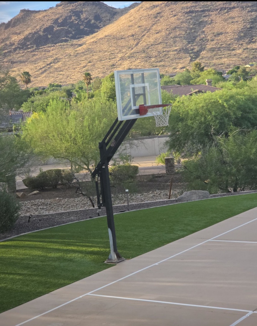 Challenge friends and family to a game on your private basketball court with stunning desert mountain views in the backdrop.