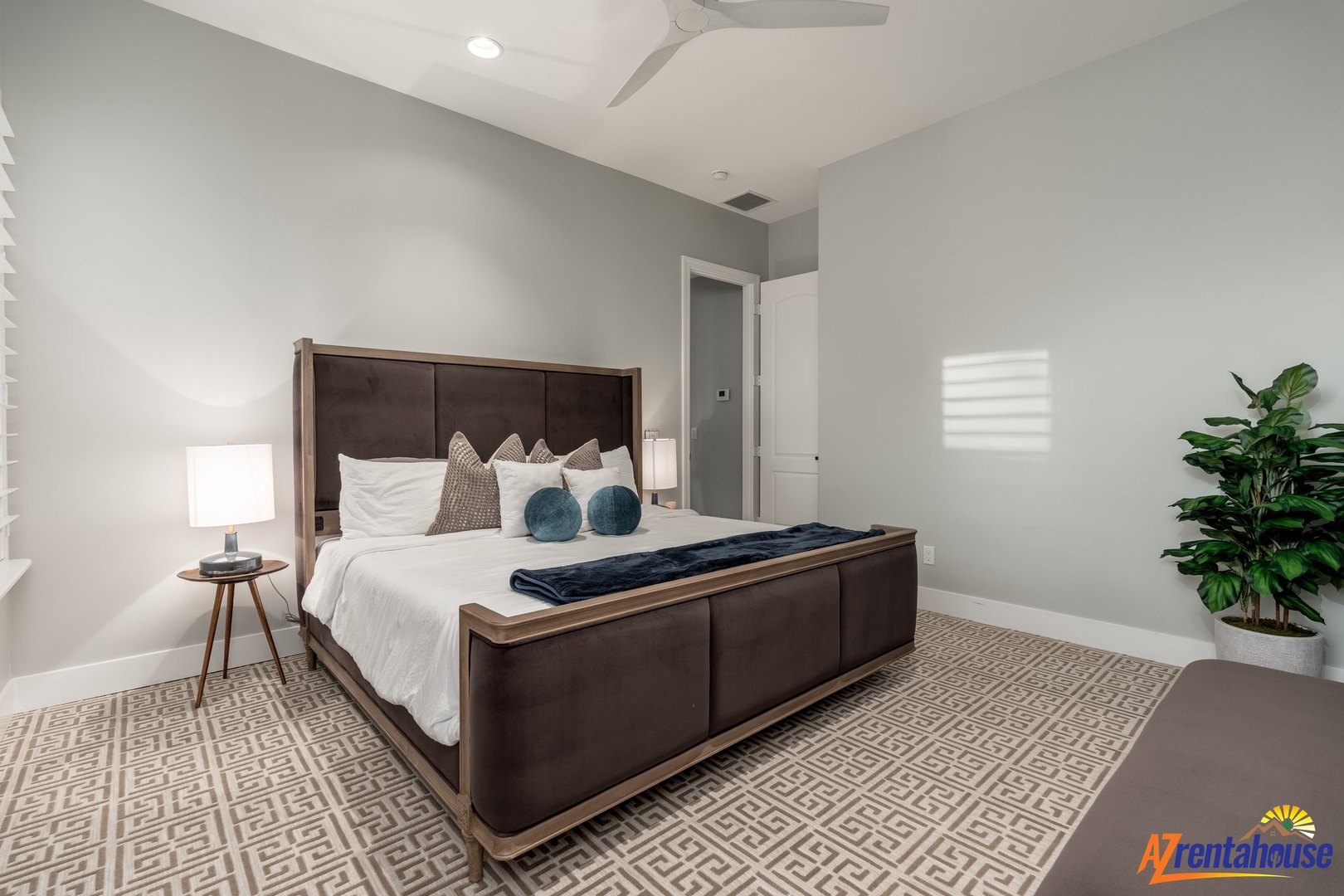 Your sophisticated bedroom sanctuary features crisp linens, warm wood accents, and soothing colors—perfect for unwinding after your adventures.