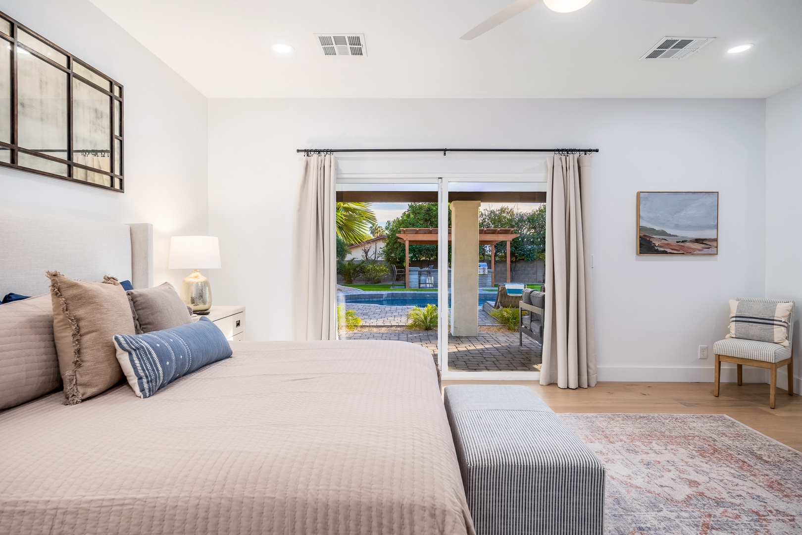 Wake up to serene pool views from your private bedroom retreat. Slide open the glass doors to your personal patio, where morning coffee feels like a luxury and evening relaxation comes naturally.