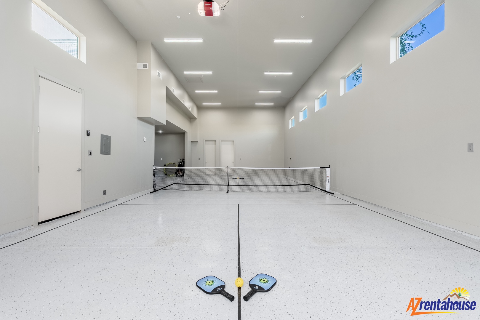 Your private pickleball court awaits competitive games and fun workouts in this bright, modern indoor space.