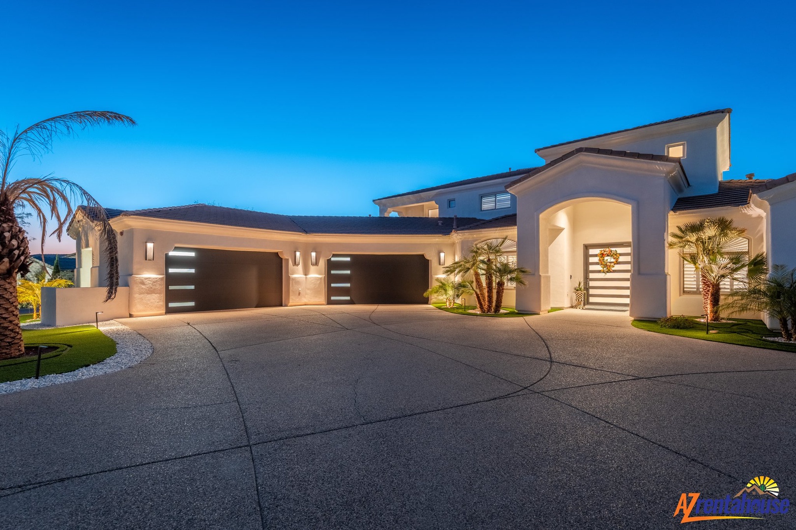 Modern luxury villa featuring elegant architecture and spacious driveway, perfectly positioned in an upscale neighborhood setting.