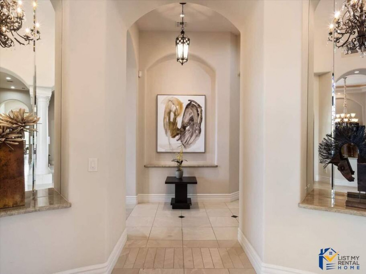 Step into elegant sophistication with soaring archways, gleaming marble floors, and crystal chandeliers that welcome you home in luxurious style.