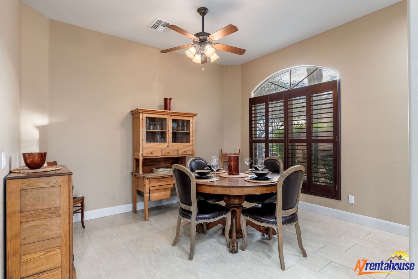 Gather around your elegant dining table for memorable meals with loved ones in this beautifully appointed space.