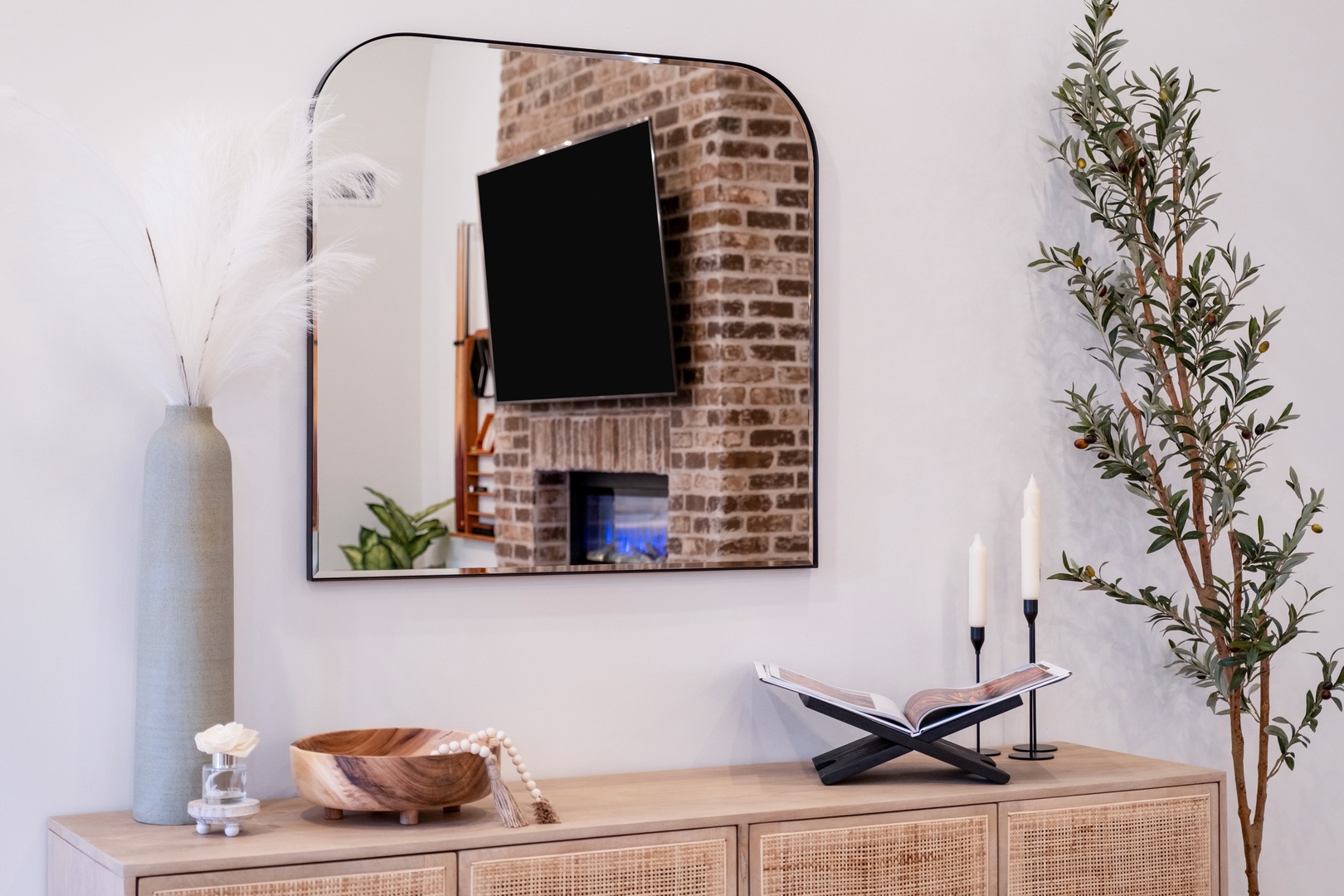 Unwind in this thoughtfully styled living space where modern elegance meets rustic charm—your perfect retreat after exploring the area.