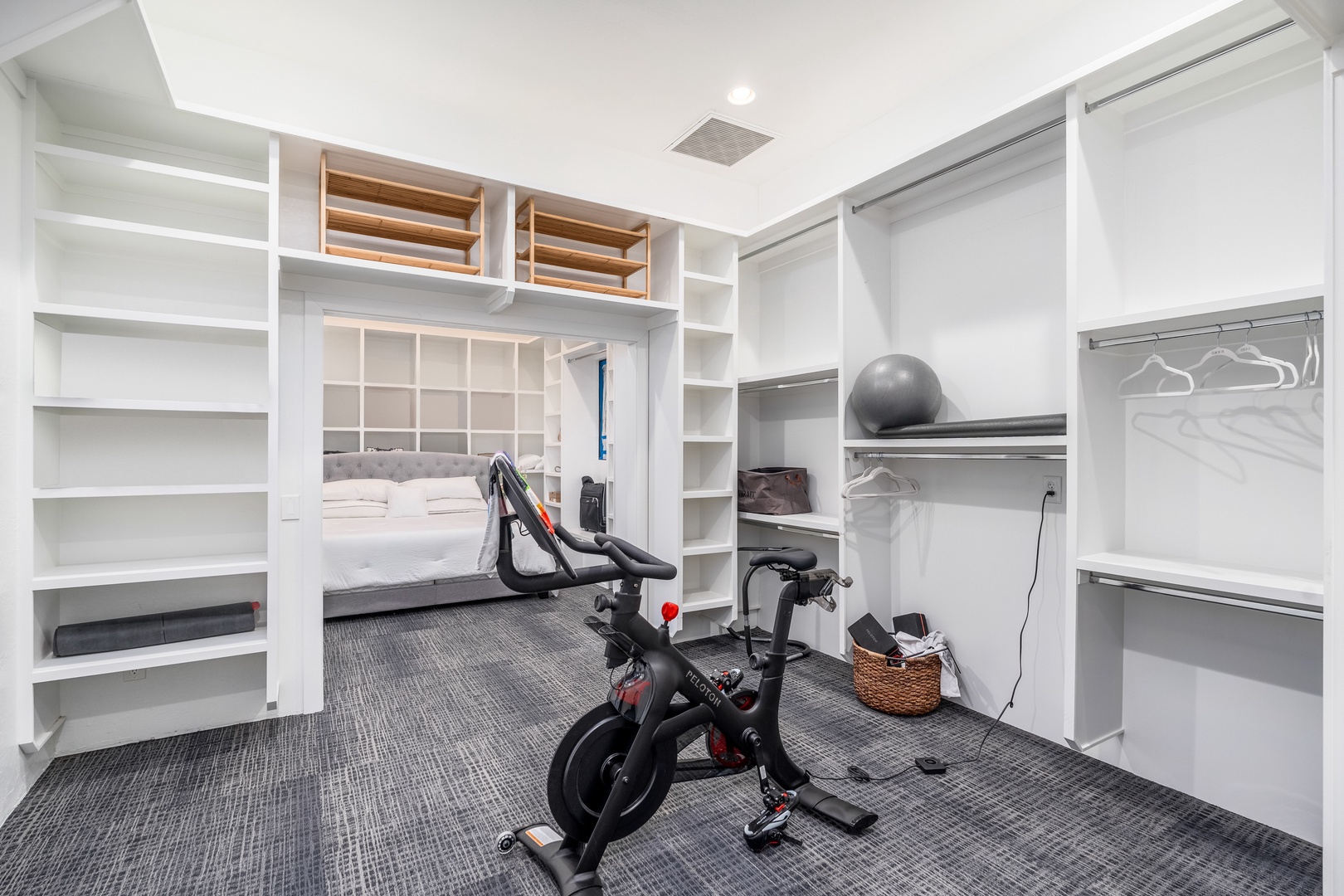 Your private workout space awaits with a stationary bike, shelving for gear, and adjoining bedroom—perfect for staying active during your stay.