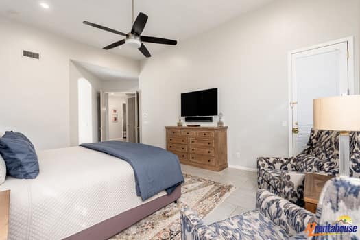 Relax in your spacious bedroom with plush bedding, modern amenities, and stylish furnishings designed for your comfort.