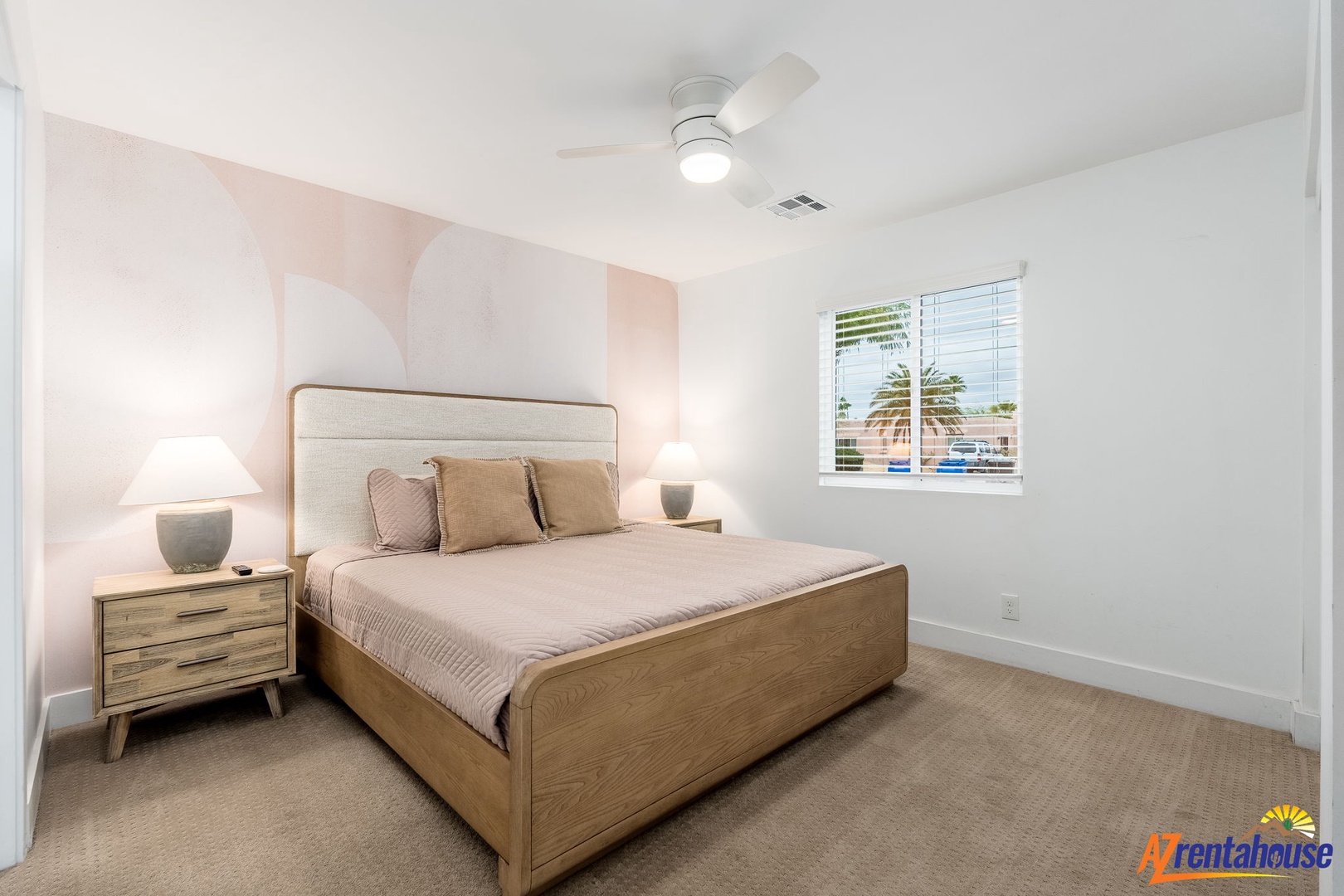 Drift into peaceful sleep in your stylish bedroom featuring soft lighting and calming neutral tones that create the perfect retreat.