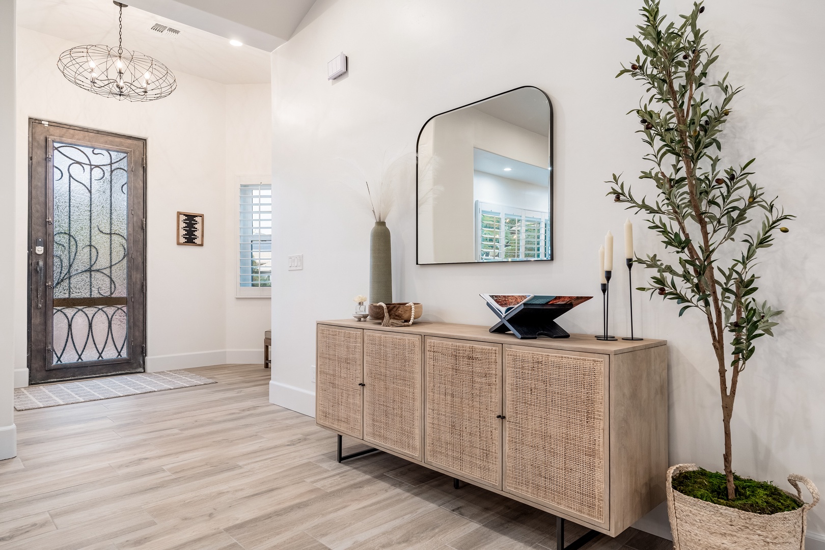 Step into your bright, welcoming entryway where natural light and modern design greet you. Thoughtful touches and open spaces set the tone for a relaxing stay.