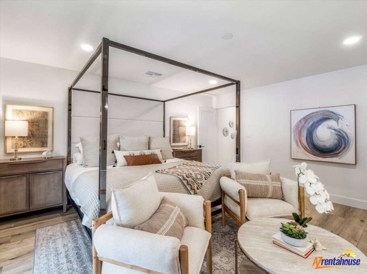 Sink into your dreamy canopy bed surrounded by elegant furnishings and contemporary art that create the perfect sanctuary for rest.