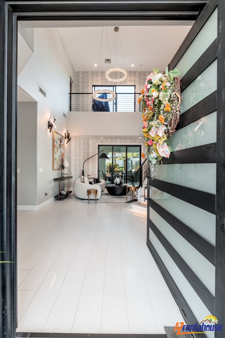 Step into your sophisticated retreat with soaring ceilings, modern art, and elegant furnishings creating the perfect atmosphere for relaxation.