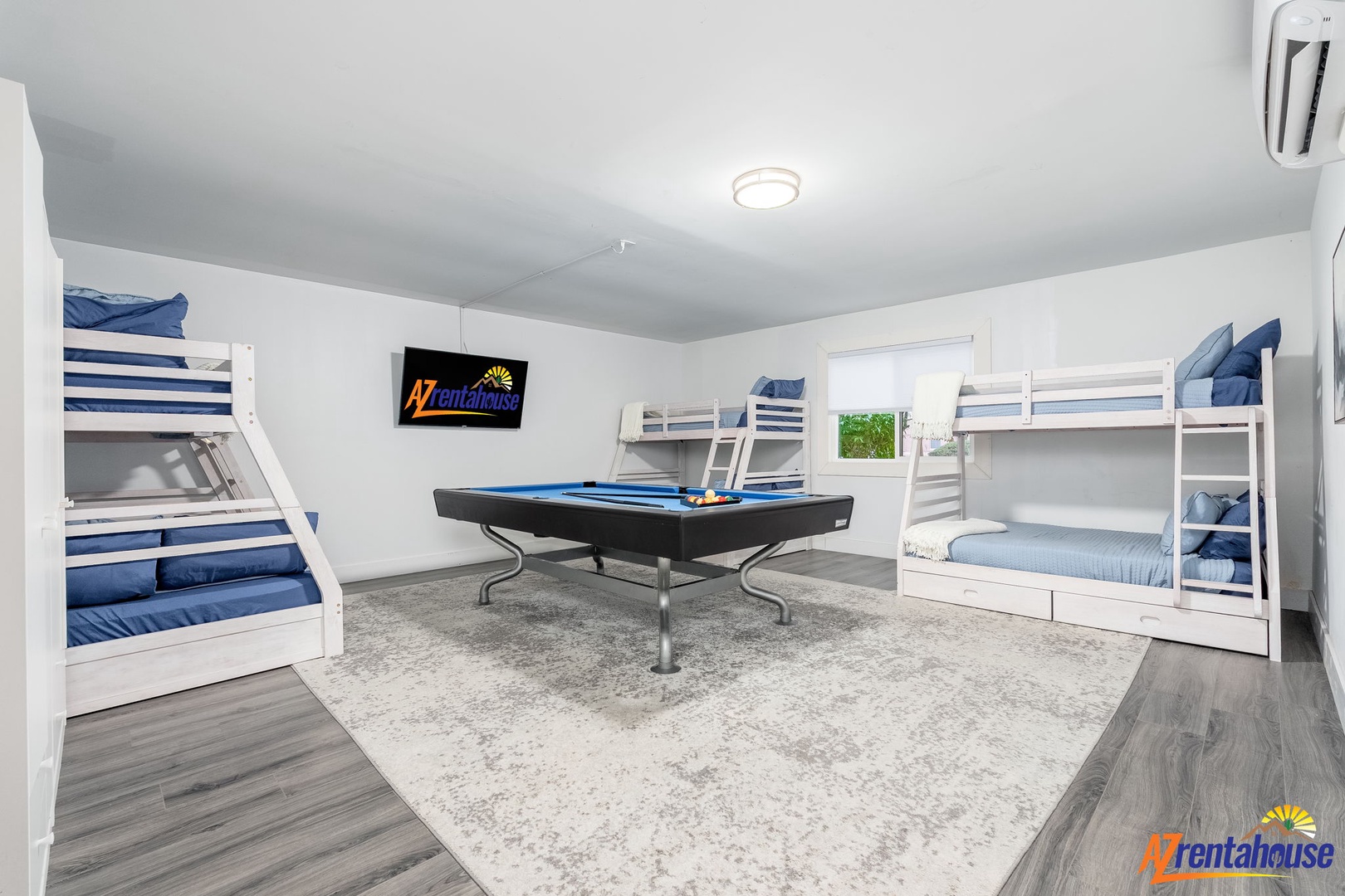 Your group will love this fun bunk room with multiple beds and a pool table for endless entertainment and bonding.