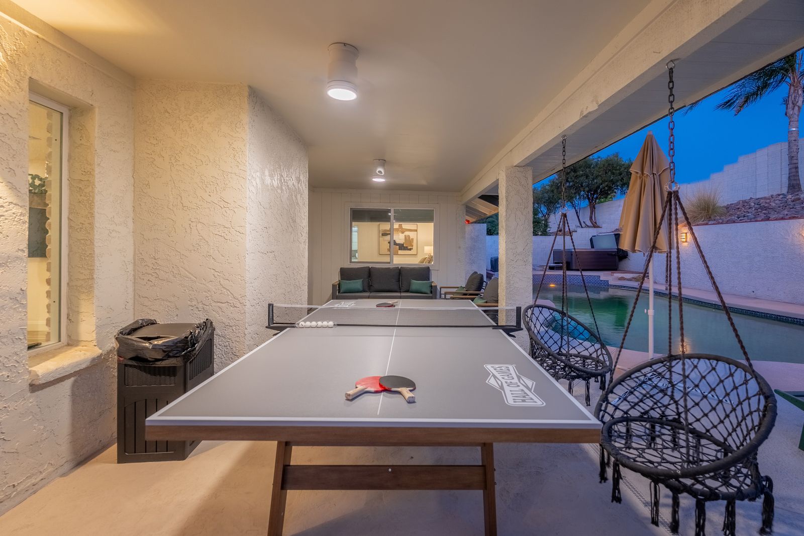 Challenge your travel companions to ping pong under the stars while lounging in hanging chairs, or unwind as twilight settles over your private poolside retreat.