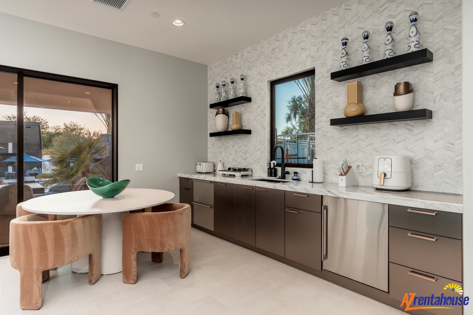 Your modern kitchen awaits with sleek finishes, premium appliances, and stylish open shelving for effortless meal prep.