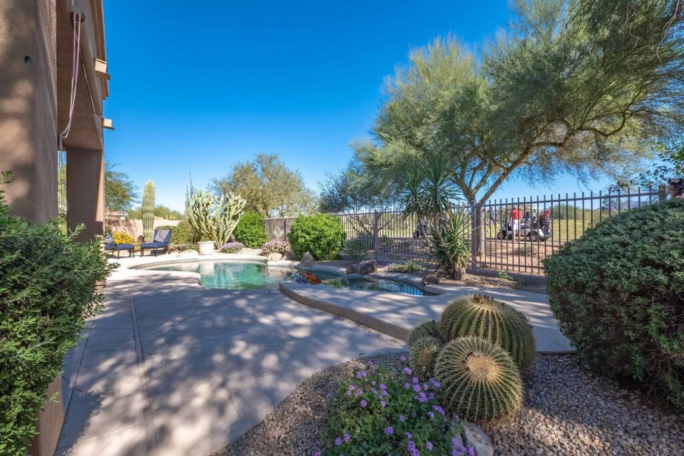Step into your private desert oasis with sparkling pool, authentic cacti gardens, and stunning mountain views.