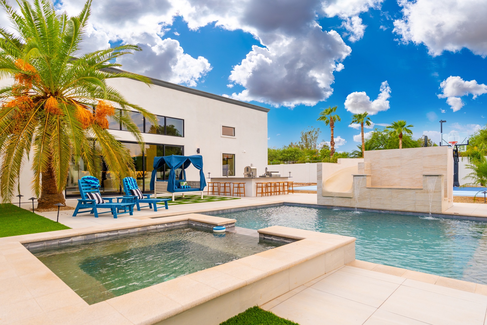 Soak up the sunshine by your private pool and spa, surrounded by swaying palms and resort-style lounge seating under brilliant desert skies.