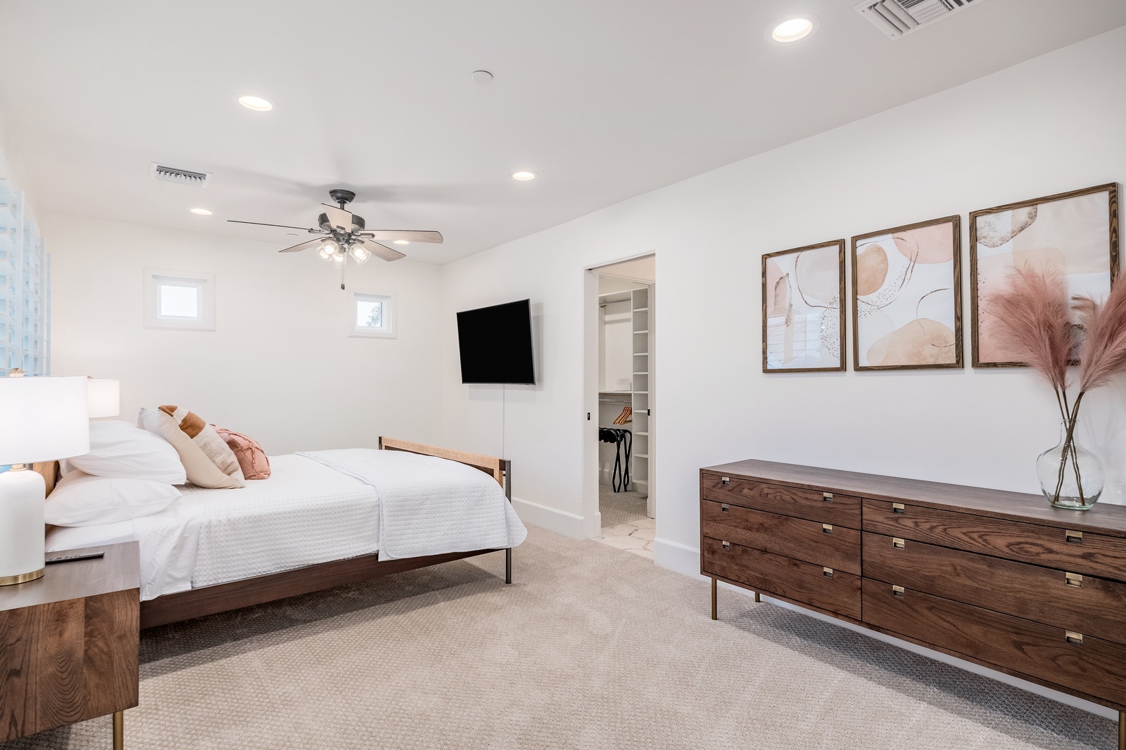 Your bright and airy bedroom awaits with a plush bed, elegant décor, and soft lighting that creates a calming retreat perfect for unwinding after a day of adventure.