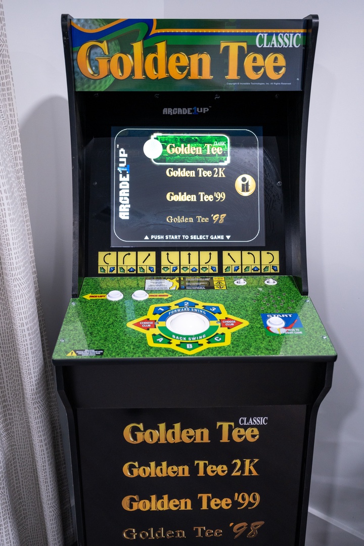 A classic Golden Tee arcade game awaits your perfect swing, complete with trackball control and multiple game versions to keep you entertained during your stay.