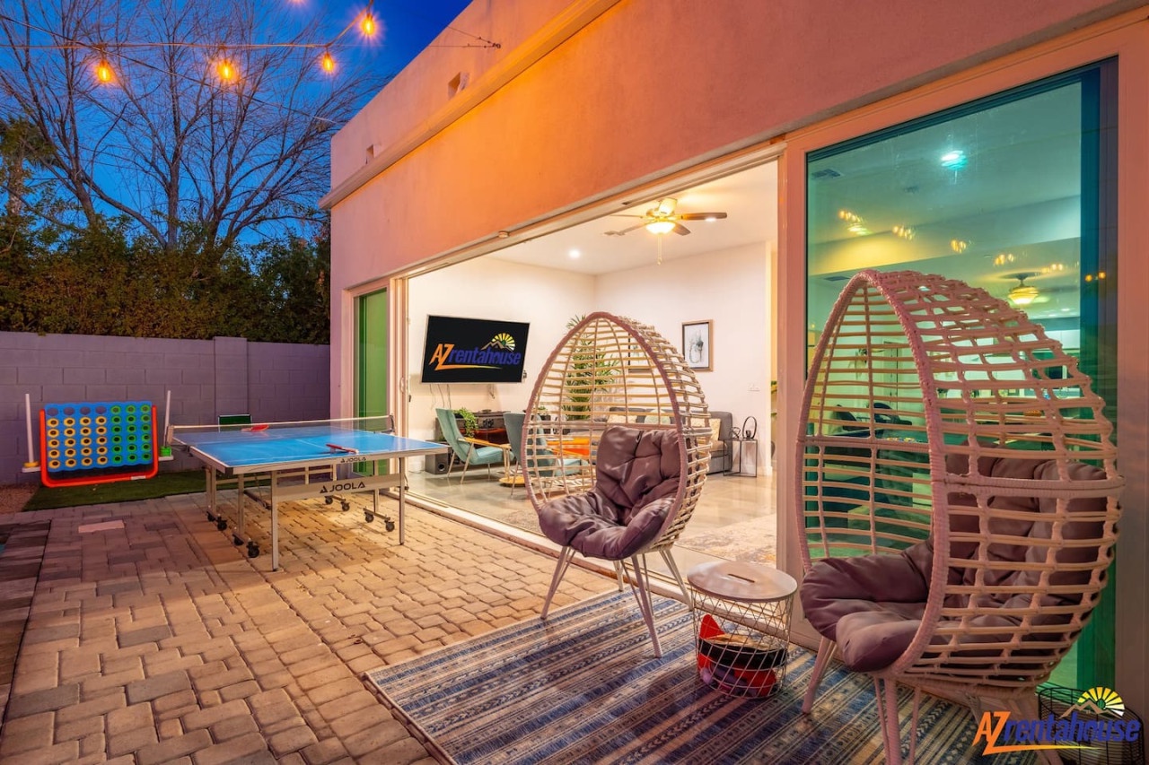 Unwind in stylish egg chairs and challenge friends to table tennis under the stars in your private game room oasis.