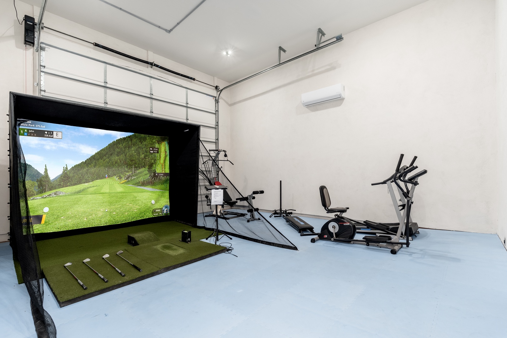 Stay active with your own private fitness room featuring workout equipment and a golf simulator for perfecting your swing anytime.
