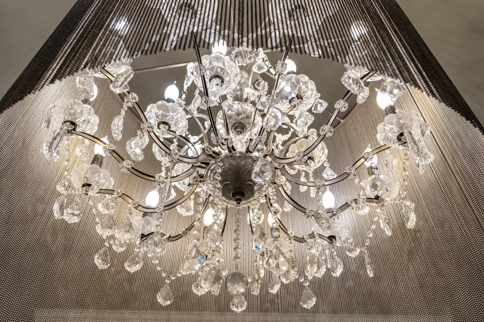 A stunning crystal chandelier creates an elegant ambiance, casting sparkling light throughout your space and adding a sophisticated touch to your stay.