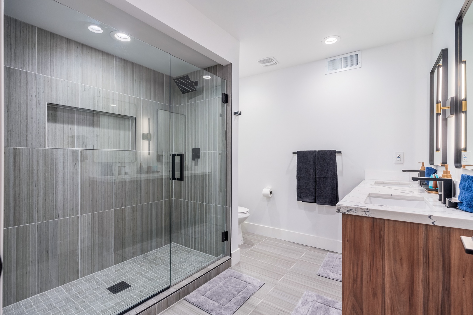 Refresh in your spa-inspired bathroom with a sleek walk-in shower, soaking tub, and modern dual vanity. Soft lighting and chic finishes make every morning feel luxurious.