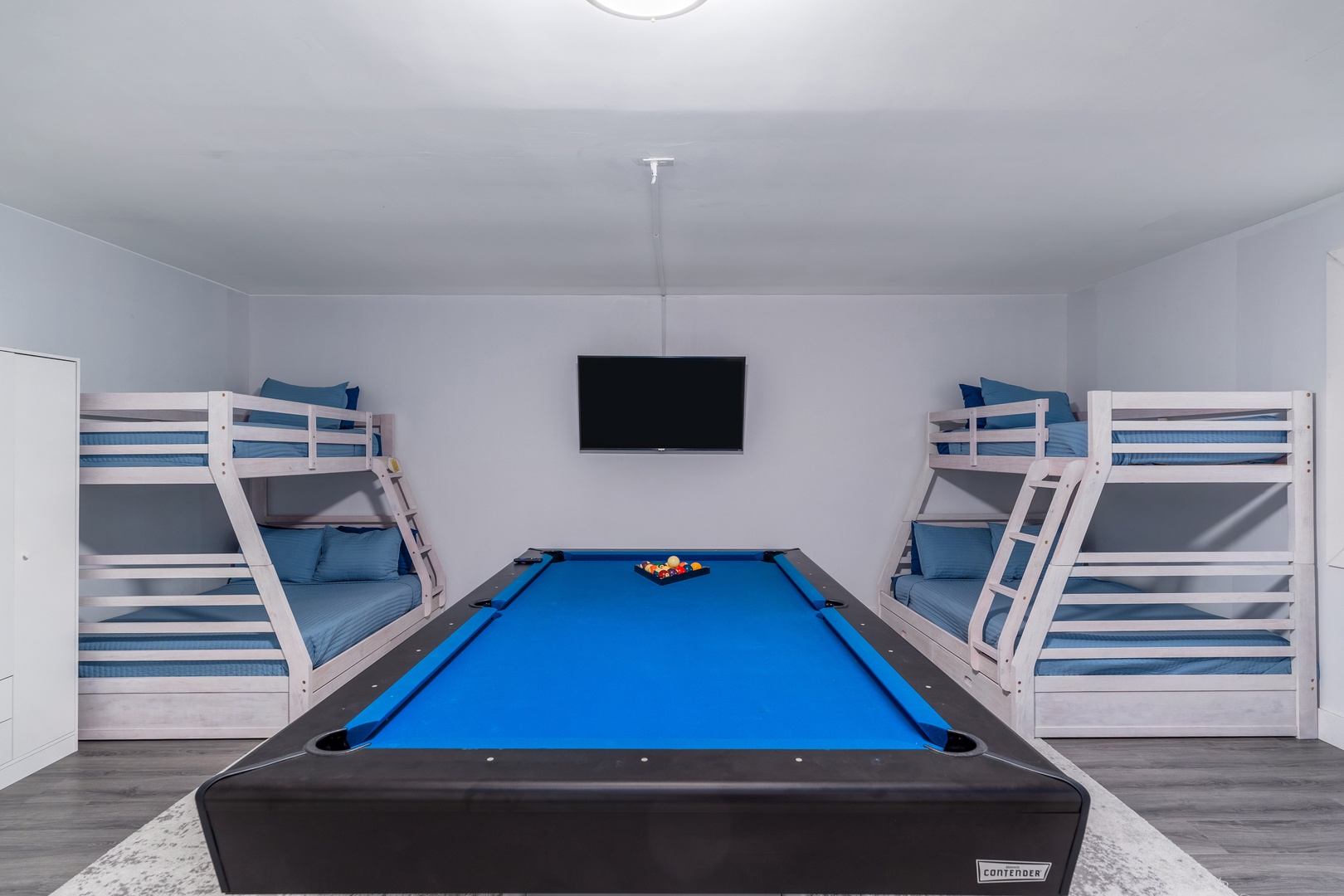 Challenge your family to a friendly game of pool in this fun-filled game room, where two sets of bunk beds provide extra sleeping space for larger groups.