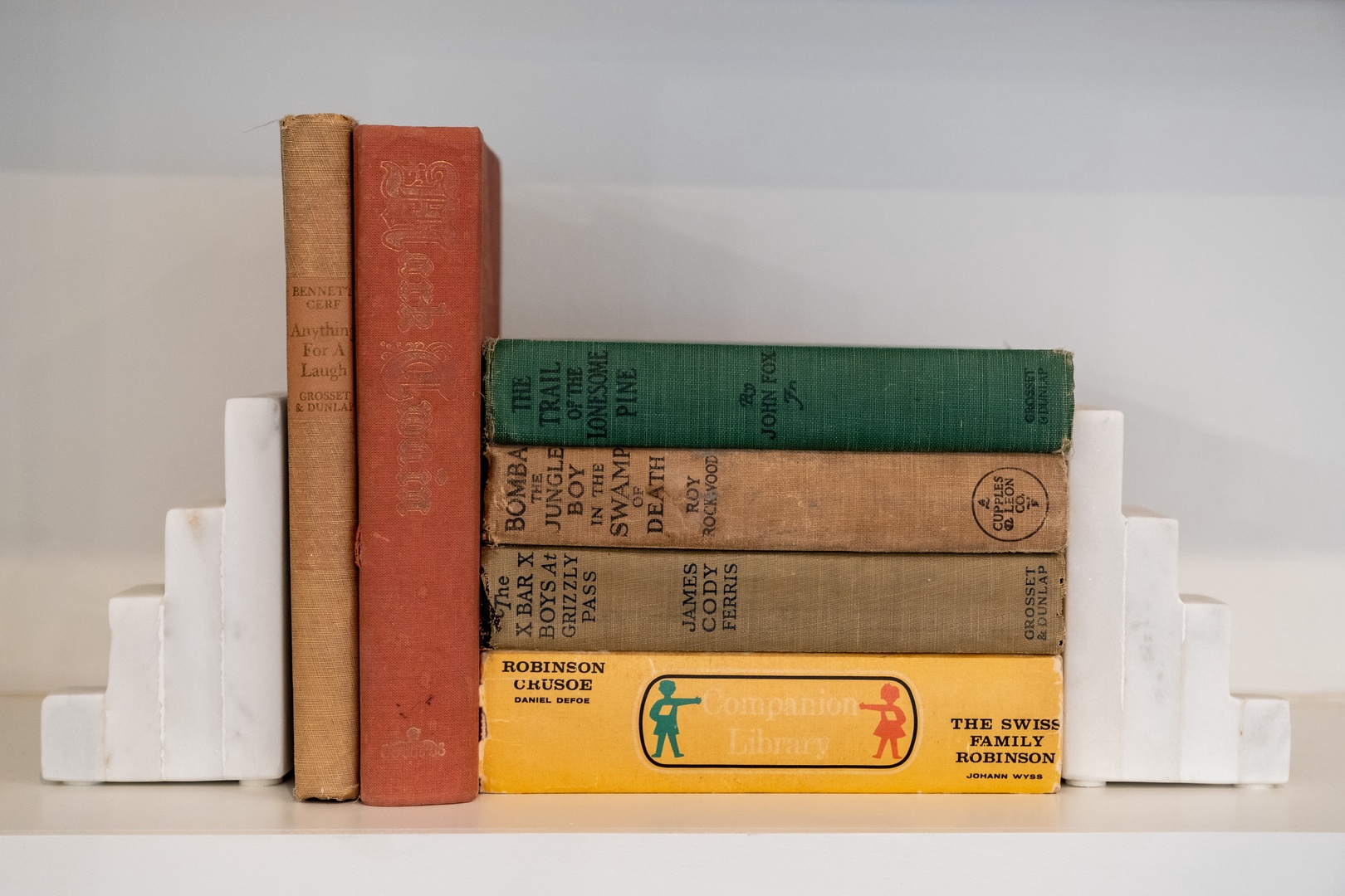 A charming collection of classic literature awaits your leisure time, with vintage volumes adding character to your personal library space.