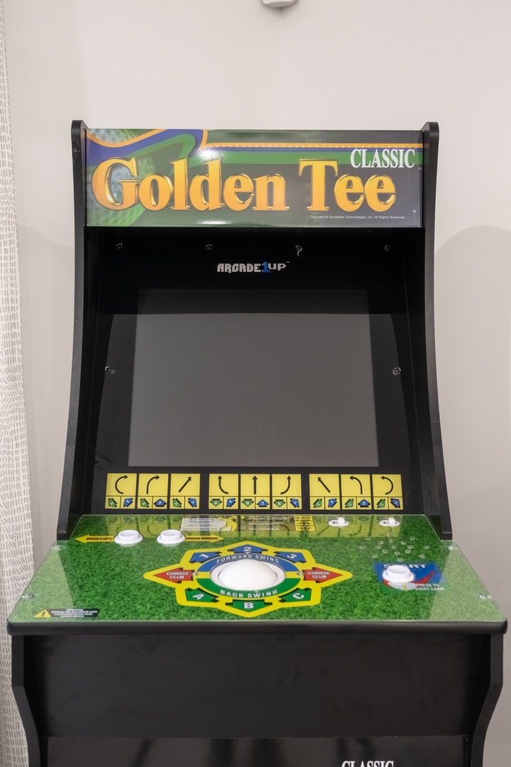 Classic Golden Tee arcade game ready for your friendly competition and nostalgic fun during downtime at the property.