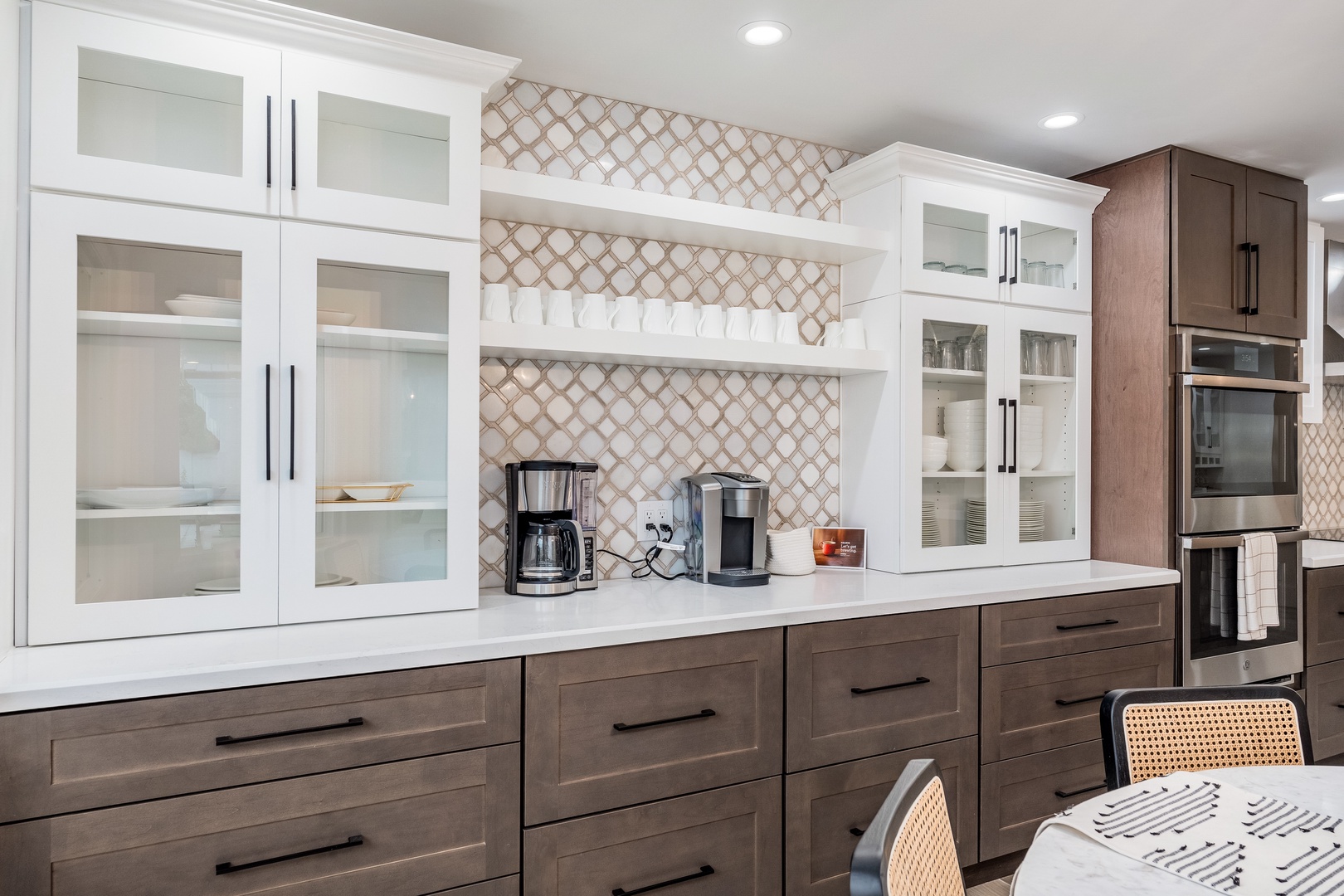Your fully equipped kitchen features modern appliances, sleek cabinetry, and a dedicated coffee station—brew your morning cup and start your day in style.