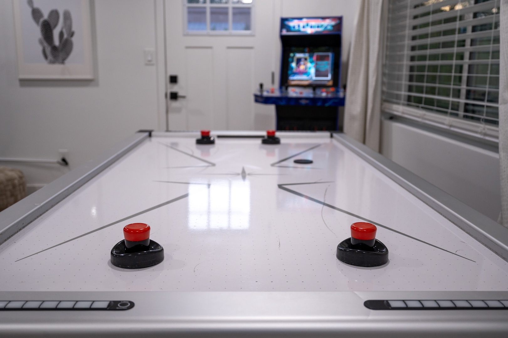 Challenge your friends to a game on the full-size air hockey table, or test your skills on the classic arcade machine in your private game room.