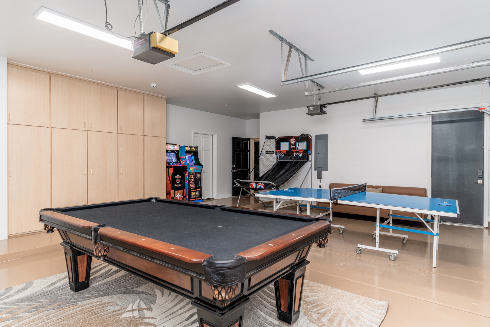 Challenge friends to billiards, ping-pong, or arcade games in your private game room with a projector for movie nights too.