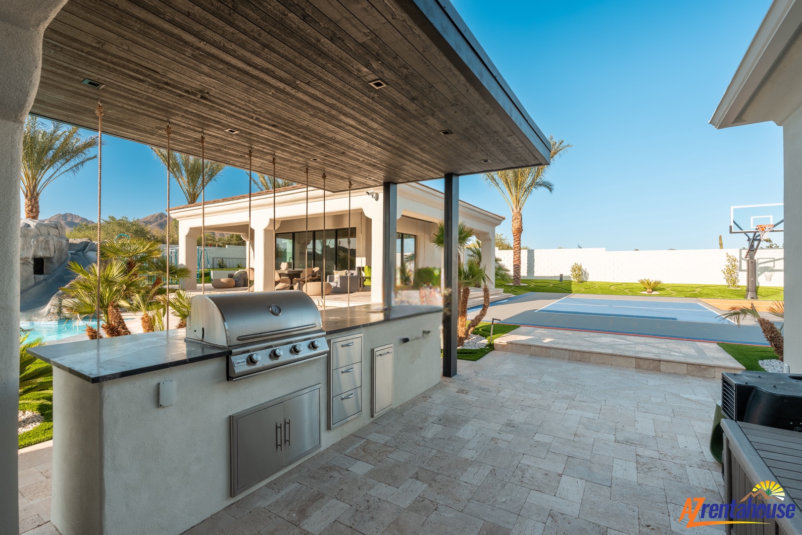 Your outdoor kitchen features premium appliances and stunning mountain views, perfect for grilling while enjoying desert sunsets.