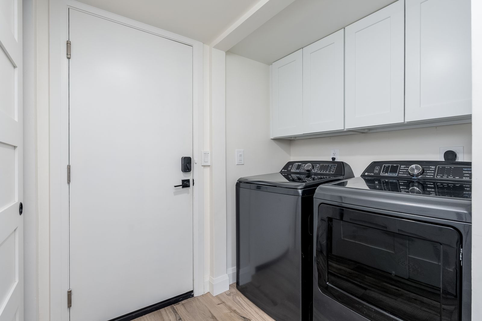 Your fully equipped laundry room features modern high-capacity machines and ample cabinet storage, making it easy to keep fresh during your stay.