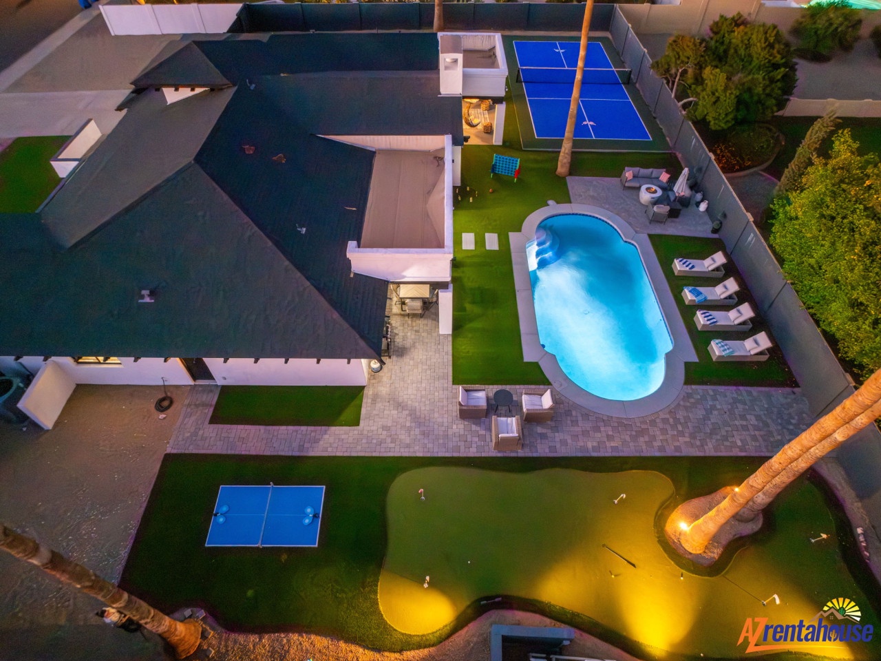Spectacular aerial view showcasing the complete property with swimming pool, tennis court, and expansive outdoor entertainment areas.